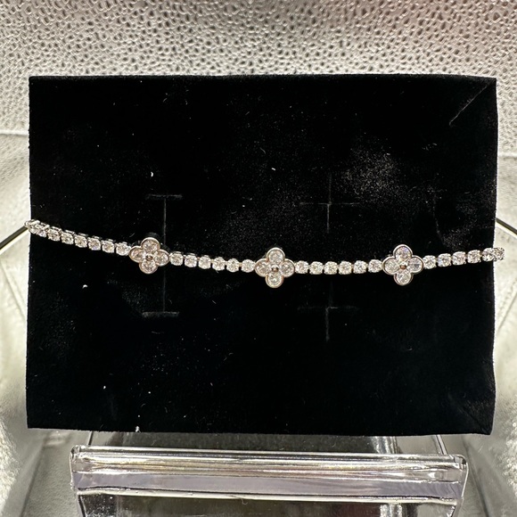 This bracelet is silver over brass with beautiful CZs and is adjustable. - Picture 8 of 8